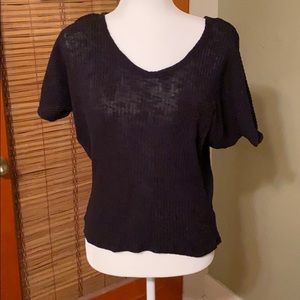 Black sheer woven top with front pocket